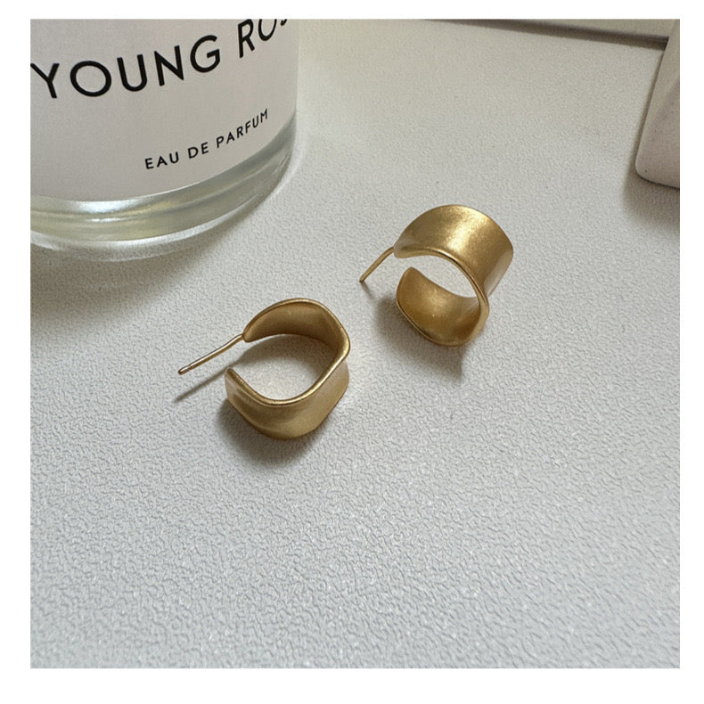 25. Minimalist C-Shaped Matte Stud Earrings