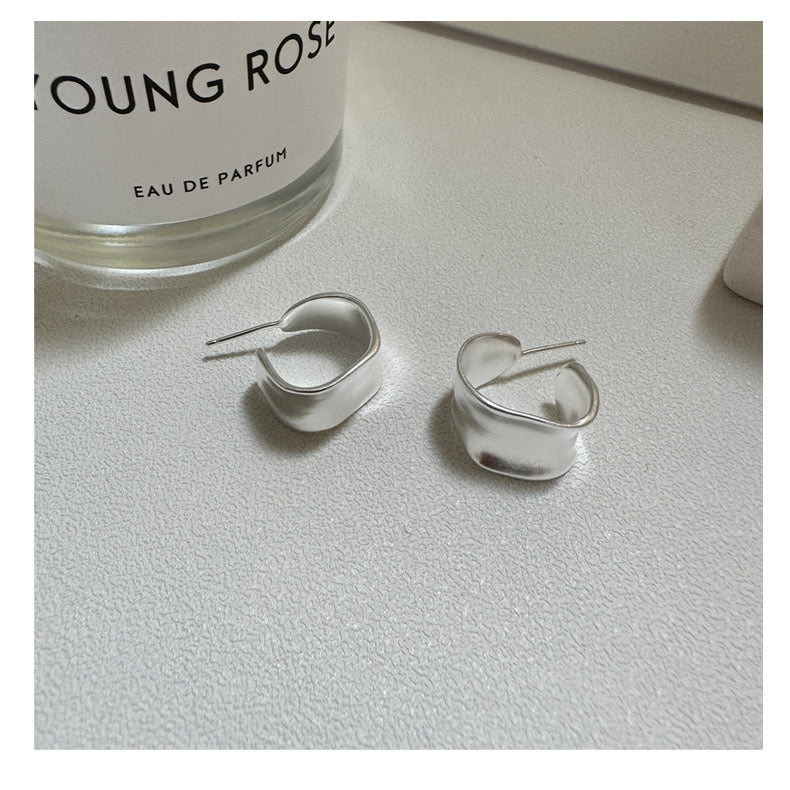 25. Minimalist C-Shaped Matte Stud Earrings